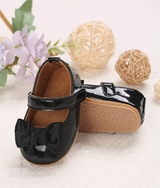 Zapatos negros para bebe